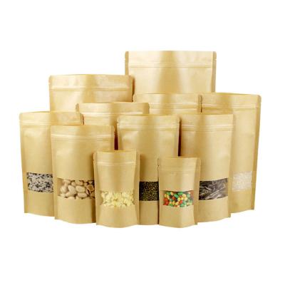 China Brown Kraft Paper Bags Wholesale Biodegradable Moisture Proof Tea / Food Packaging Zipper Stand Up Zipper Lock Paper Bag for sale