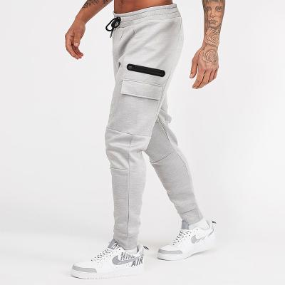 China Anti-Wrinkle Mens Streetwear Pantalones Fitness Pants Mens Gym Workout Breathable Casual Pants for sale