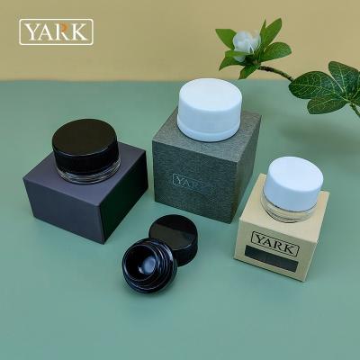 China Food Custom Low Profile 3ml 7ml 9ml Thick Bottom Glass Concentrate Jars Small Container for sale