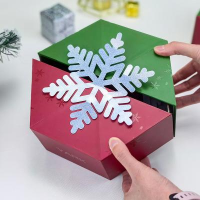 China Handmade CMYK Printing Hexagon Christmas Gift Box Custom Christmas Snowflake Magnet Packaging Paper Box for sale