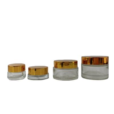 China Wide Empty Cream Jar Glass Injection Cream Bottle Injection Product Packaging Supplier Face And Eye Cosmetic Mouth Cream Container With Metal Lid for sale