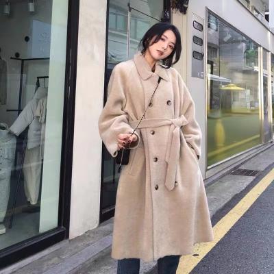 China Chic autumn and winter grassland new grain sheep shearling coat women's lamb fur coat along for sale