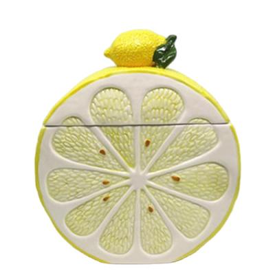 China Custom Ceramic Novelty Lemon Shape Cookie Jar Food Grade Cookie Jar Storage Jar for sale