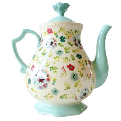 China Viable Ceramic Flower Teapot With Cold Strainer Kettle For Afternoon Tea Table Coffee Large Pot for sale