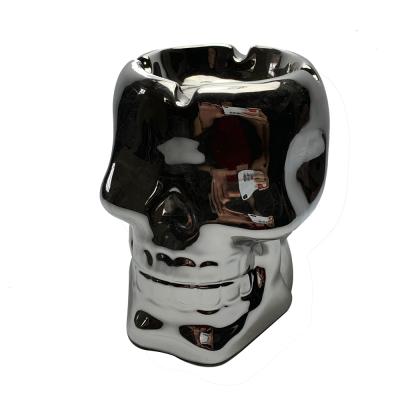 China Simply gold plated skull ashtray, creative hand made ceramic ashtray, cigar ashtray for sale