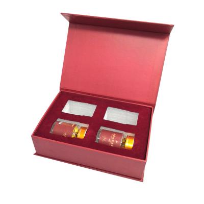 China Recyclable Custom Logo Luxury Magnetic Book Shaped Tea Gift Packaging Boxes With Foam Insert for sale