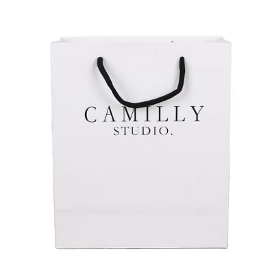 China Recycled Materials Logo Custom Printed Paper Gift Package Bags White Shopping Bag With Handles for sale