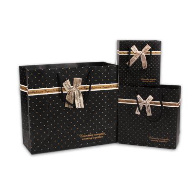 China Factory direct sale recyclable in stock business gift black paper bags with low MOQ for sale