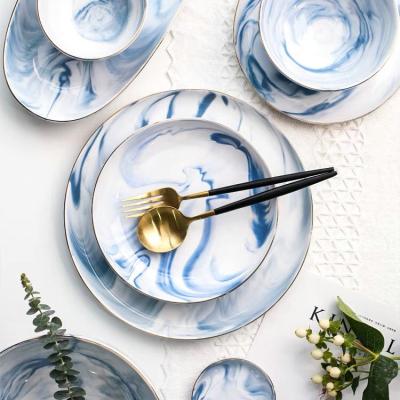 China Sustainable Style Nordic Luxury Wedding Ceramic Marble Dinner Plates With Gold Rim for sale