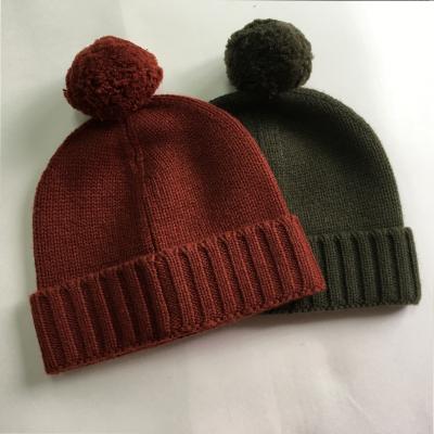 China COMMON winter quality cashmere solid color popular selling cable knitted 100% cashmere beanie with pom for sale