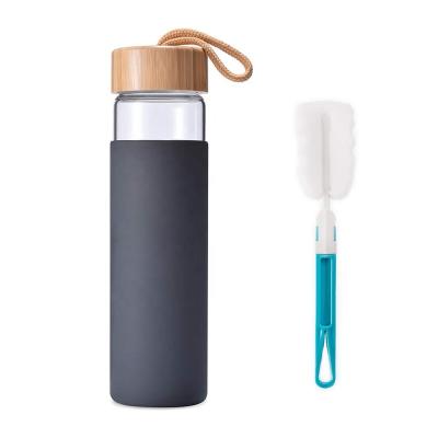 China 550ML Borosilicate Glass Sustainable Water Bottle With Bamboo Lid And Silicone Sleeve for sale