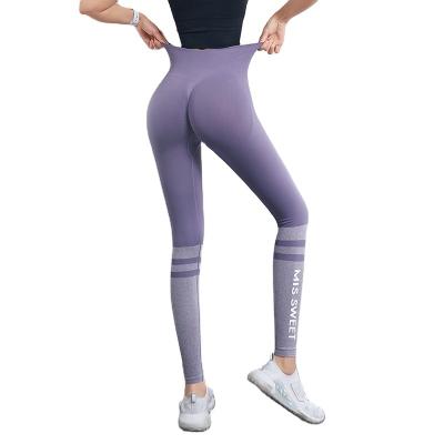 China Antibacterial Yoga Pants Quick-Drying Tight-fitting Yoga Hip Pants Letter Sports Letter Sports Gaiters for sale