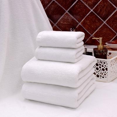 China Compressed White Hotel Resort Bathroom Towels Staple Long Egyptian Cotton Bath Towel High Absorption 70x140cm Cotton SPA Towel for sale