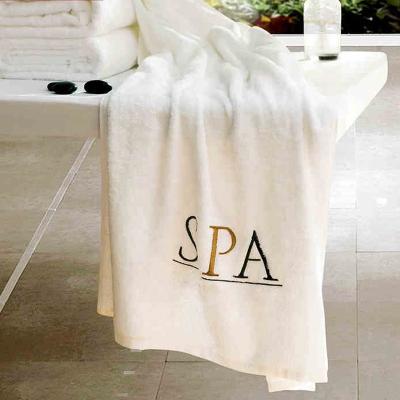 China 100% Egyptian Cotton Cotton Terry SPA Towel Compressed Logo Customized 600g White Single Bath Towel for sale