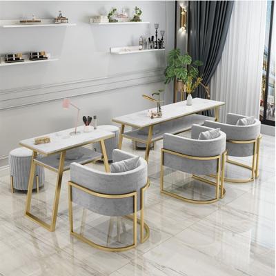 China Durable cheap professional nail tech tables nageltisch manicure tables nail salon table nail table manicure table and chair set marble for sale