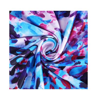 China Stretch Factory Price Weft Knitted Four Way Stretch Custom Lycra Printed Fabric For Dancer Wear for sale