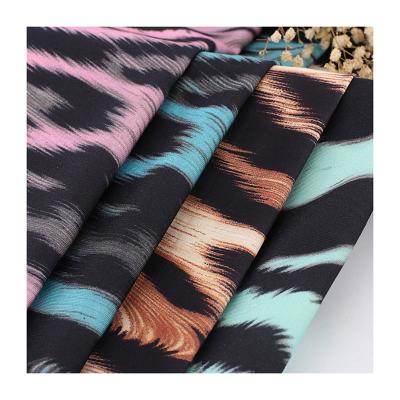 China Factory Price Four Way Stretch Leopard Custom Printed Lycra Fabric For Dancer Wear for sale