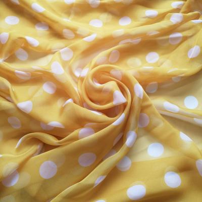 China Antistatic Digital Printing Yellow Color Printed Polka Dots Chiffon Fabric For Summer Dress for sale