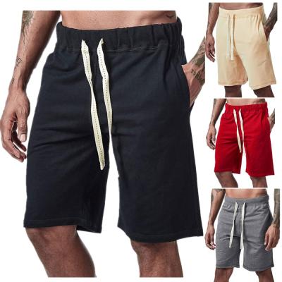 China Solid Color Breathable Hot Selling Thin Sports Loose Casual Drawstring Fitness Running Men's Beach Shorts for sale