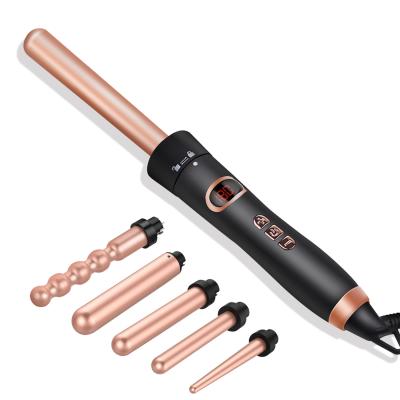 China Multifunctional Interchangeable Portable Hair Curler Curling Iron Hair Curling Stick Set Five in One Hair Curler for sale