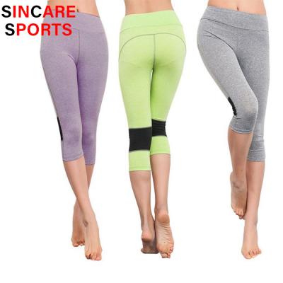 China Hot Selling Breathable 3/4 Yoga Pants With Mesh Net Capris Pants Suits Women for sale