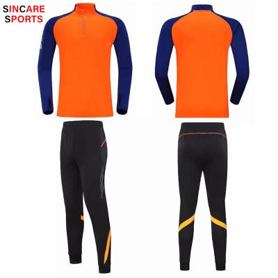 China Antibacterial Orange Tracksuits Kits Warm Up Jackets 1/4 Zipper Soccer Training Suit For Men Custom Your Logo for sale