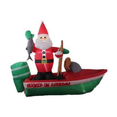 China Outdoor Santa Claus Standing In Inflatable Boat For Christmas Yard Decoration for sale