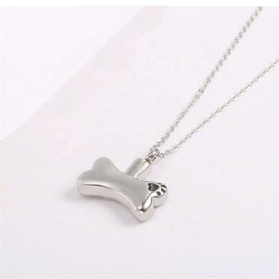 China Vintage LIVE4U Dog Bone Keepsake Cremation Urn Stainless Steel Memorial Pendant Necklace For Jewelry Gift for sale