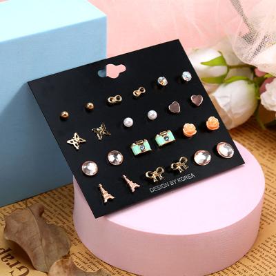 China 2023Fashion Jewelry FASHIONABLE Earrings Set Women's Single Arc Figure 8 Turn Digital Metal E for sale