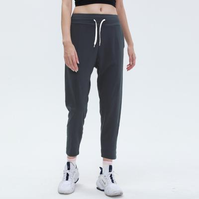 China Custom Fitness Drawstring Waist Breathable Elastic Sweatpants Women Joggers Wholesale Yoga Pants With Pockets for sale