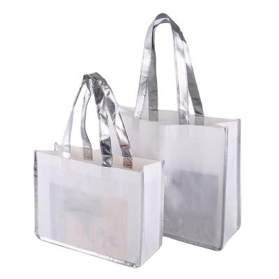 China Custom High Quality White Fluorescent Ribbon Handled Wrapping Non Woven Bag for sale