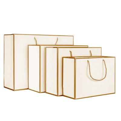 China New Recyclable High Quality White Luxury Custom Wedding Cardboard Handle Gift Bag for sale