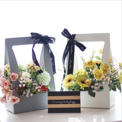 China Recycled Materials Unique Foldable Paper Flower Basket Flowers Show Gift Box Packaging Flowers Carry Paper Bag for sale