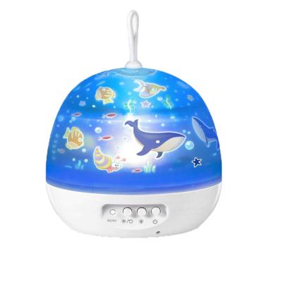 China 2021 Gift LED Creative Decoration Plastic Children's Rotating Moon Night Light Moon Starry Night Sky Projector for sale