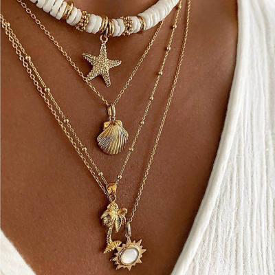 China New Eco-friendly Soft Pottery Starfish Multilayer Shell Pendant Necklace Retro Sun Necklace Jewelry For Women for sale