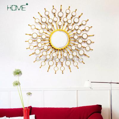 China Modern Handmade Antique Decorative Sun Shaped Metal Wall Mirror for sale