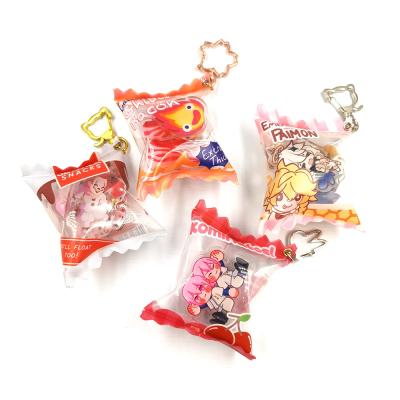 China Anime Custom Made Transparent Candy Cartoon Key Chain Printed Acrylic Candy Inflatable Charms for sale