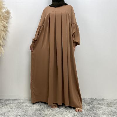 China Muslim Women Prayer Clothing 10 Colors Muslim Round Neck Abaya Dress Kaftan Islamic Dubai Turkey Styles Abaya Plain Muslim Pleated Dress With Pockets for sale