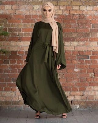 China Muslim Women Prayer Clothing Wholesale Middle East Dubai Muslim Dress Solid Color Plus Size Lace Up Muslim Dress for sale