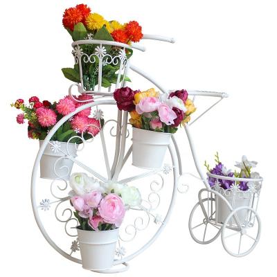 China Wedding Viable Decoration Outdoor Patio Garden Bicycle Design Iron Stands To Flower Pots Decoration Flower Stand for sale