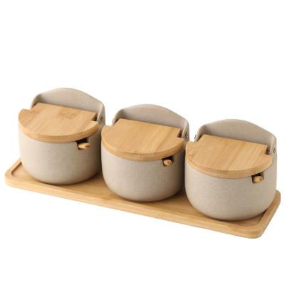 China Sustainable Cylinder Kitchen Condiment Dispenser Canister Sets Japanese Style 3 Pcs Ceramic Spice Jar Set for sale