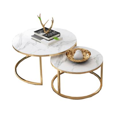 China 2021 Contemporary simple modern creative luxury combination light living room coffee table panel rocks small coffee table round table for sale