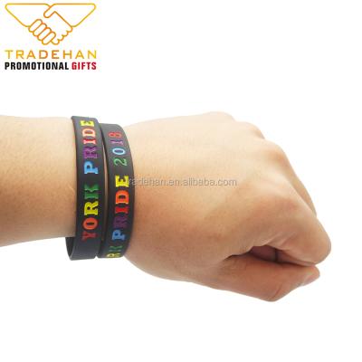 China Events Silicone Wristband Debossed Rubber Wristband Rainbow Colors Silicone Wristbands for sale