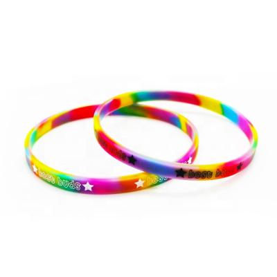 China Small Thin Events Silicone Wristband Debossed Silicone Rubber Rainbow Custom Wristband for sale