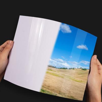 China Widely Used 180gsm 230gsm Cast Inkjet Coated Photo Paper Single Sided A4 High Gloss Paper For Inkjet Printer for sale