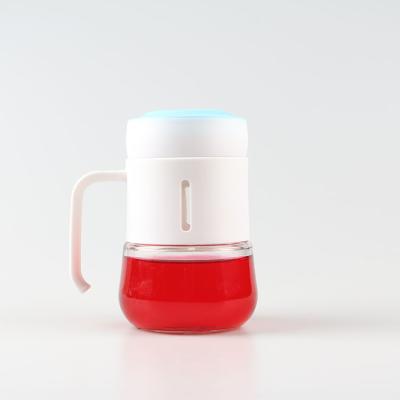 China High Quality Beverage Glass Water 400ml Bottles Glass Drinking Tea Cup With Plastic Handle for sale