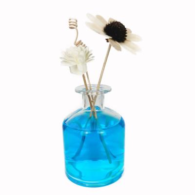 China Eco-friendly crystal glass for perfume bottle 250ml perfume oil glass bottle with stem and fiber rattan for sale