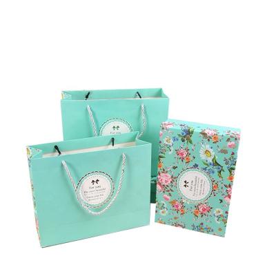 China Recyclable Square Delicate Gift Box And Custom Paper Gift Bags Wholesale Green Paper Bags Twist Cotton To Handle Shopping Bags for sale