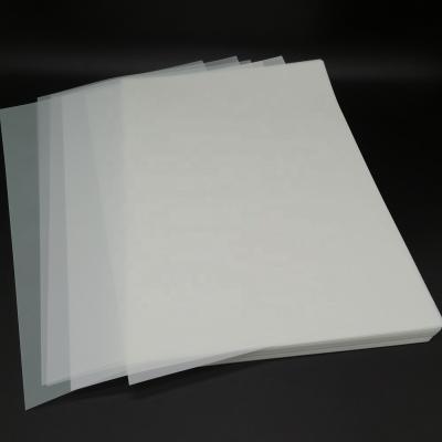 China Textiles PET film A4 size hot sale a4 side dtf printer double heat transfer film white ink PET film for sale