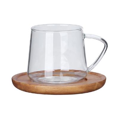 China Elegant Sustainable Borosilicate 300ml Clear Tea Glass Coffee Cup With Saucer Glass Wooden Coffee Cup With Handle for sale